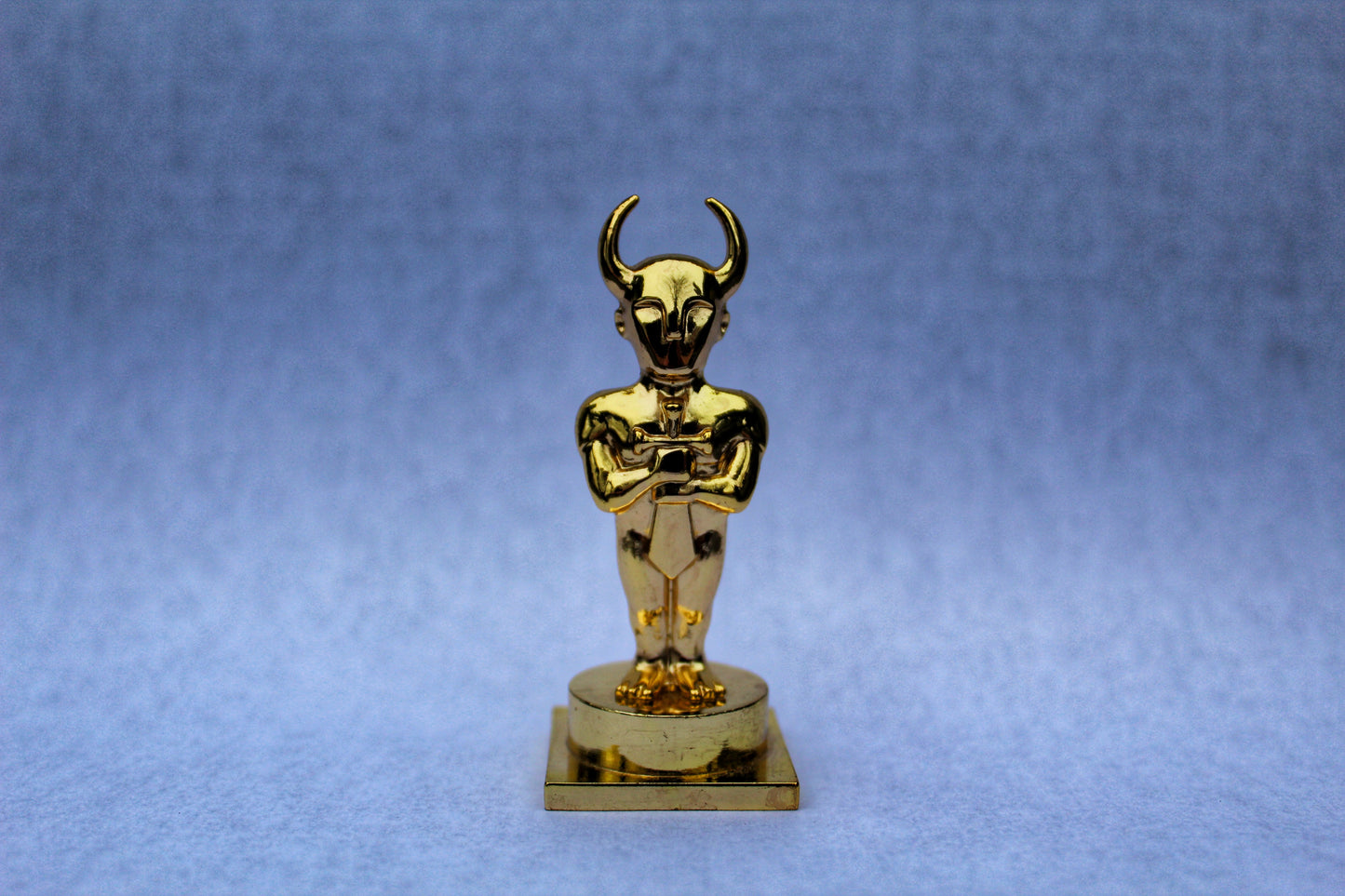 Earthbound Mani Mani Faux Gold Statue